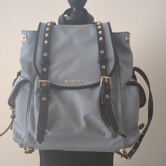 Michael Kors Handbags - Michael Kors Light Blue Backpack with Black Straps and Gold Hardware